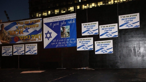 Signs at Rabin Square in support of Sgt. Azaria (Photo: Motti Kimchi)